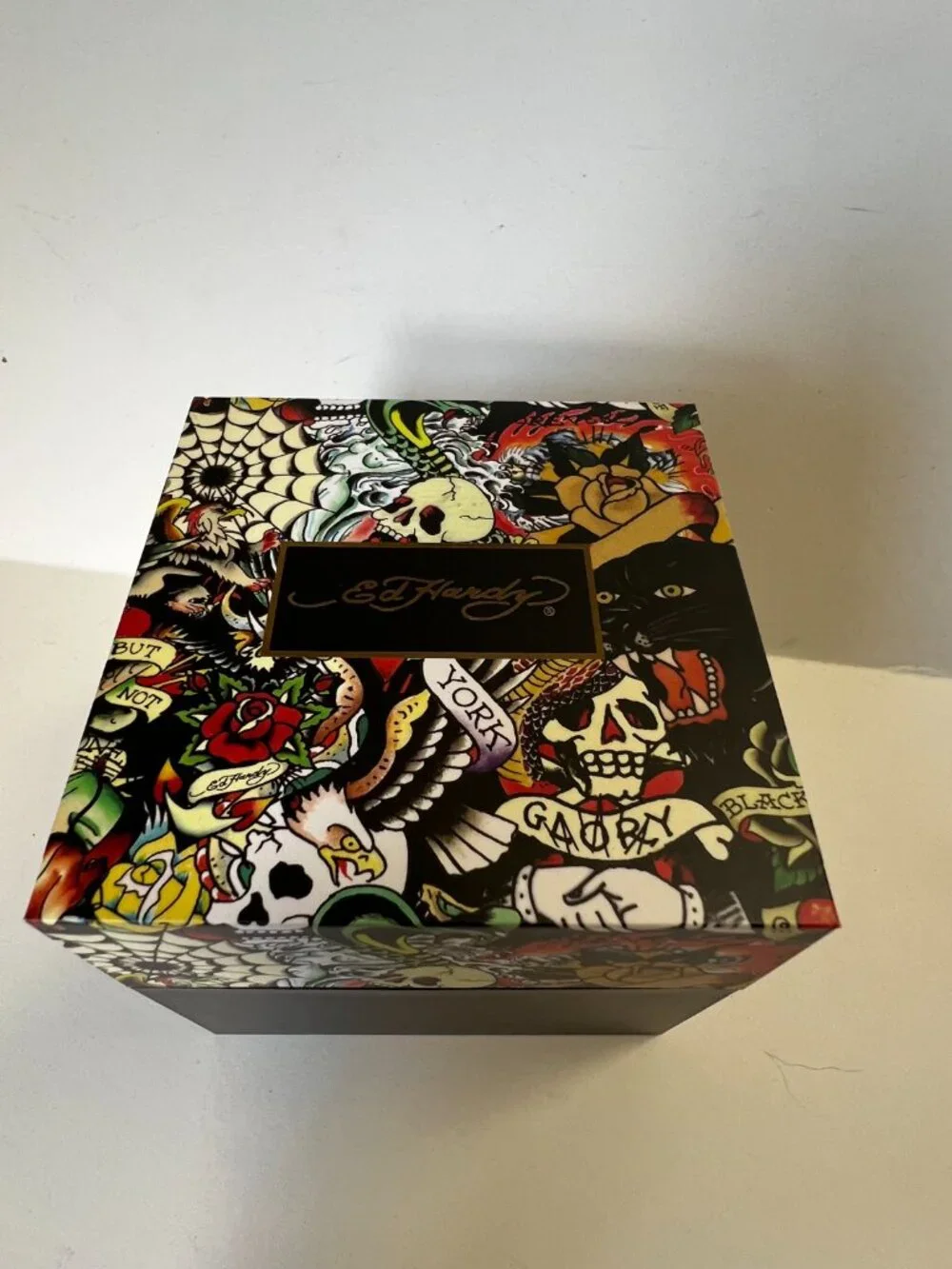 Ed Hardy men's sport wristwatch. Black rubber band. Gold case. Analog. Skeleton…